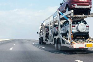 Car shipper transporting cars across the country.