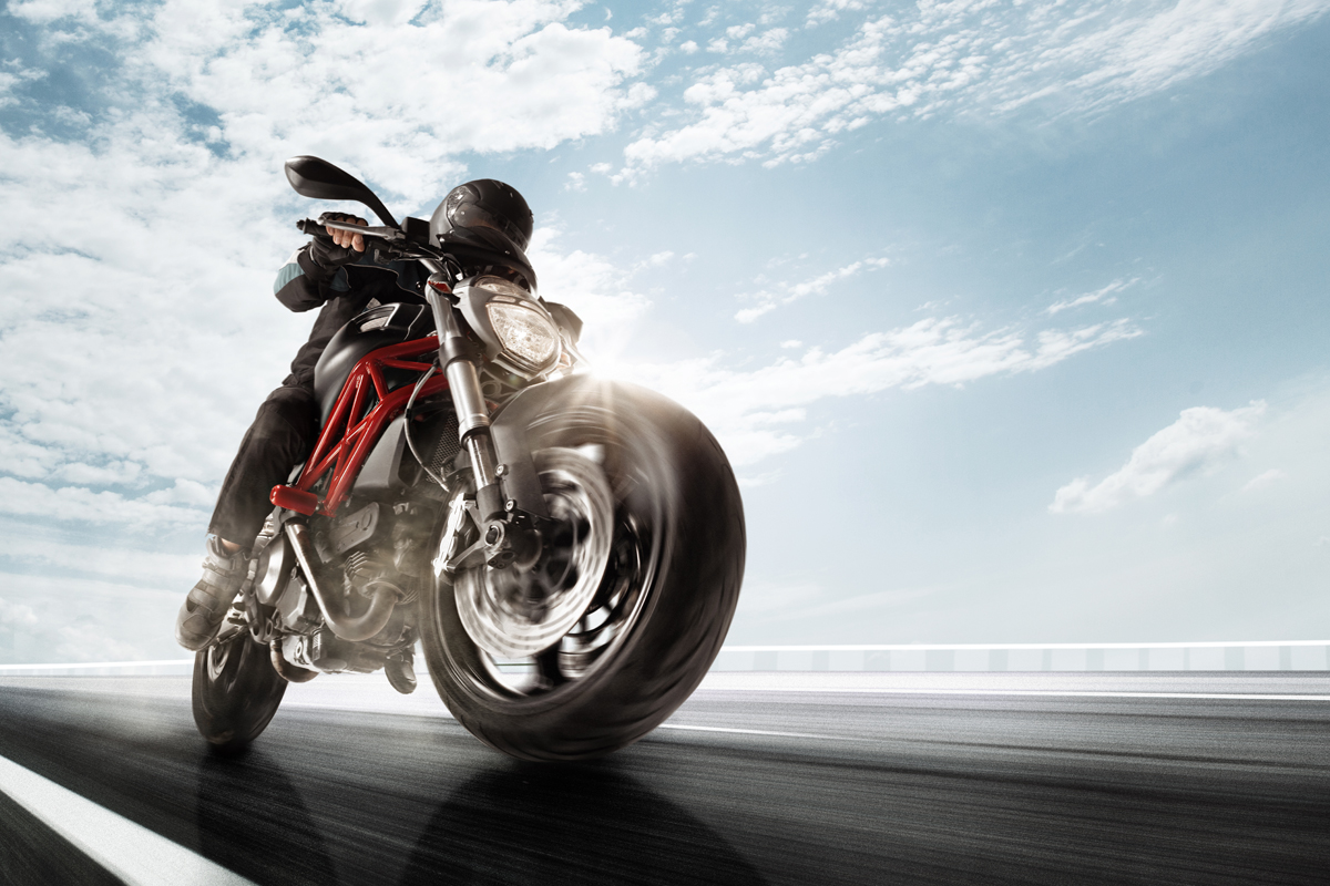 photo of a person riding their motorcycle.