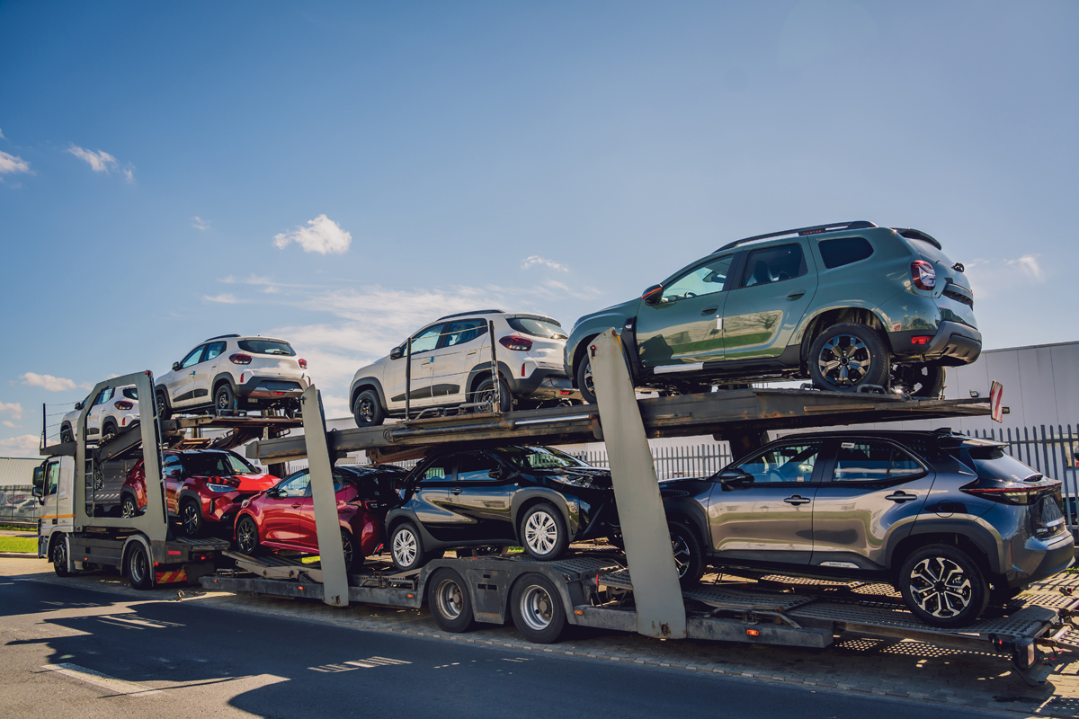 Photo of an auto carrier transporting off-lease or repossessed vehicles
